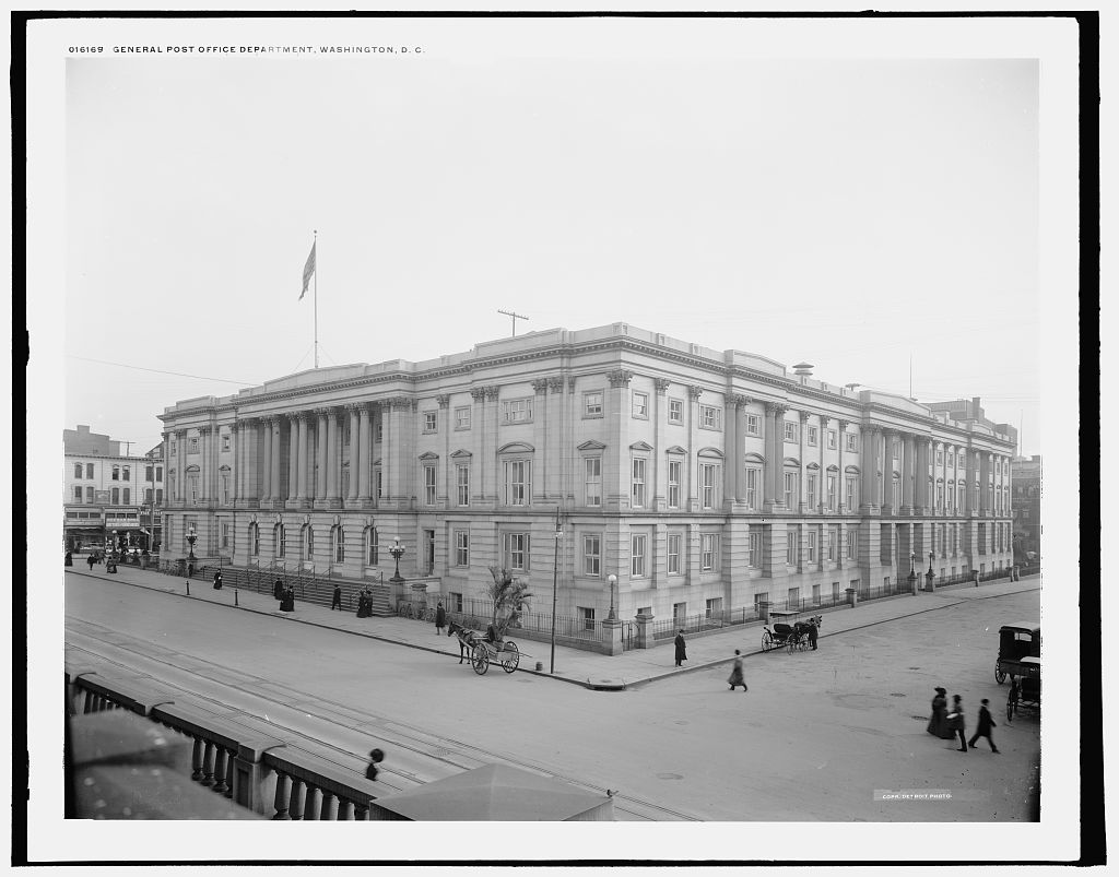 The completed General Post Office Department building, Washington, D.C., photographed circa 1900–1906 after Thomas U. Walter's expansion closed the block into a full rectangle.