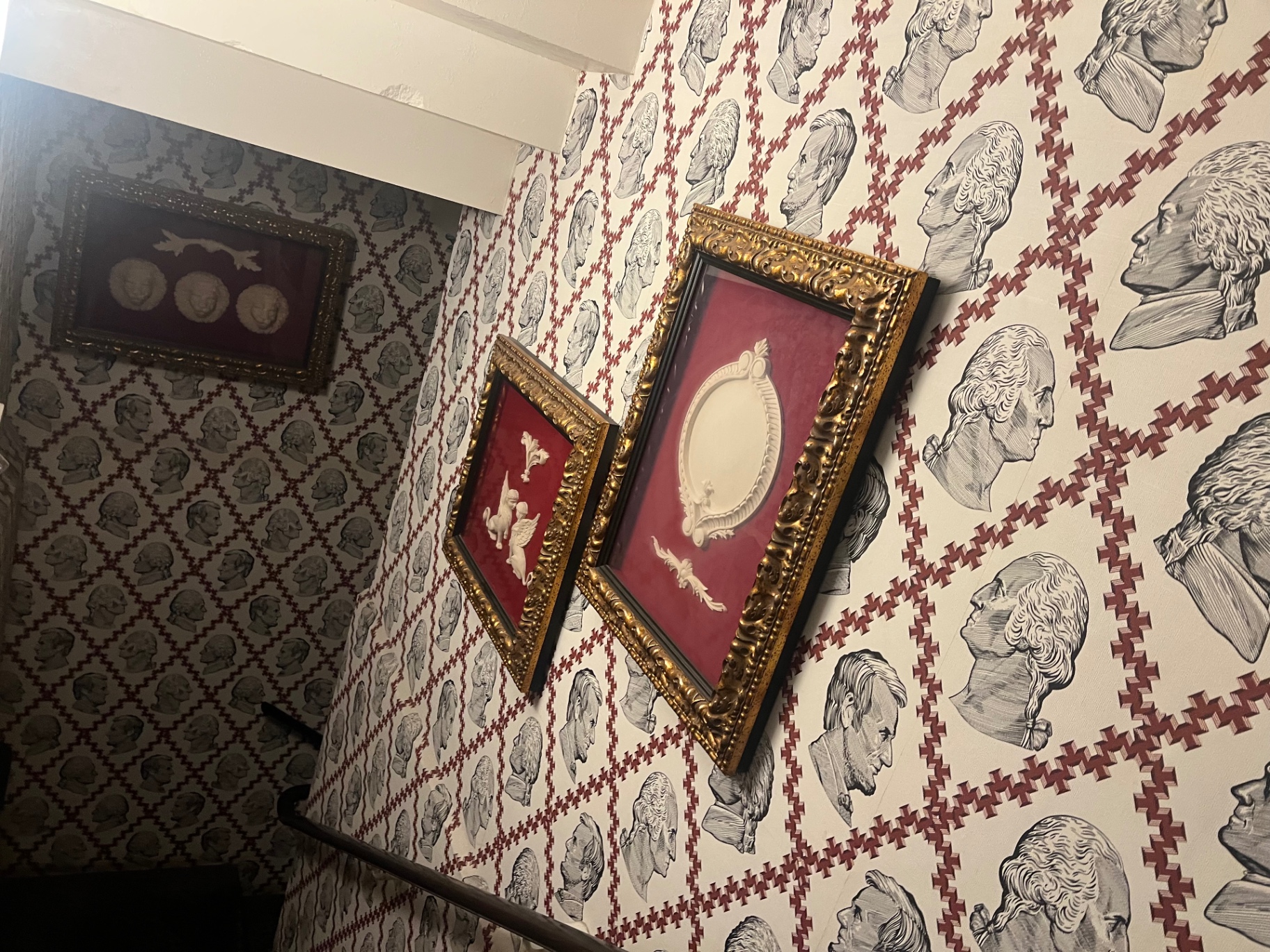 The presidential-profile stairwell wallpaper
